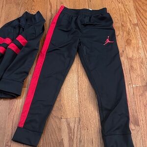 Jordan Kids Black and Red jacket and jogger set size small. Great condition